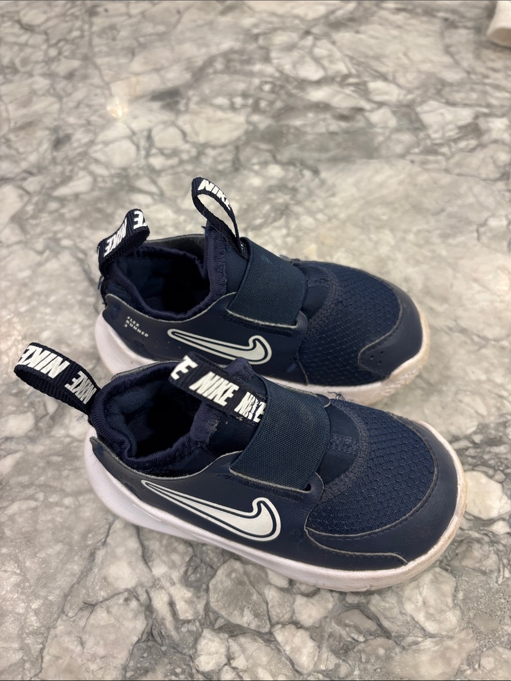 Nike Kids Navy and White Slip-On Sneakers